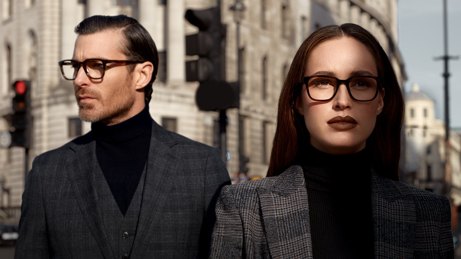 Premium Photo  Strong stylish man wearing glasses posing on clear